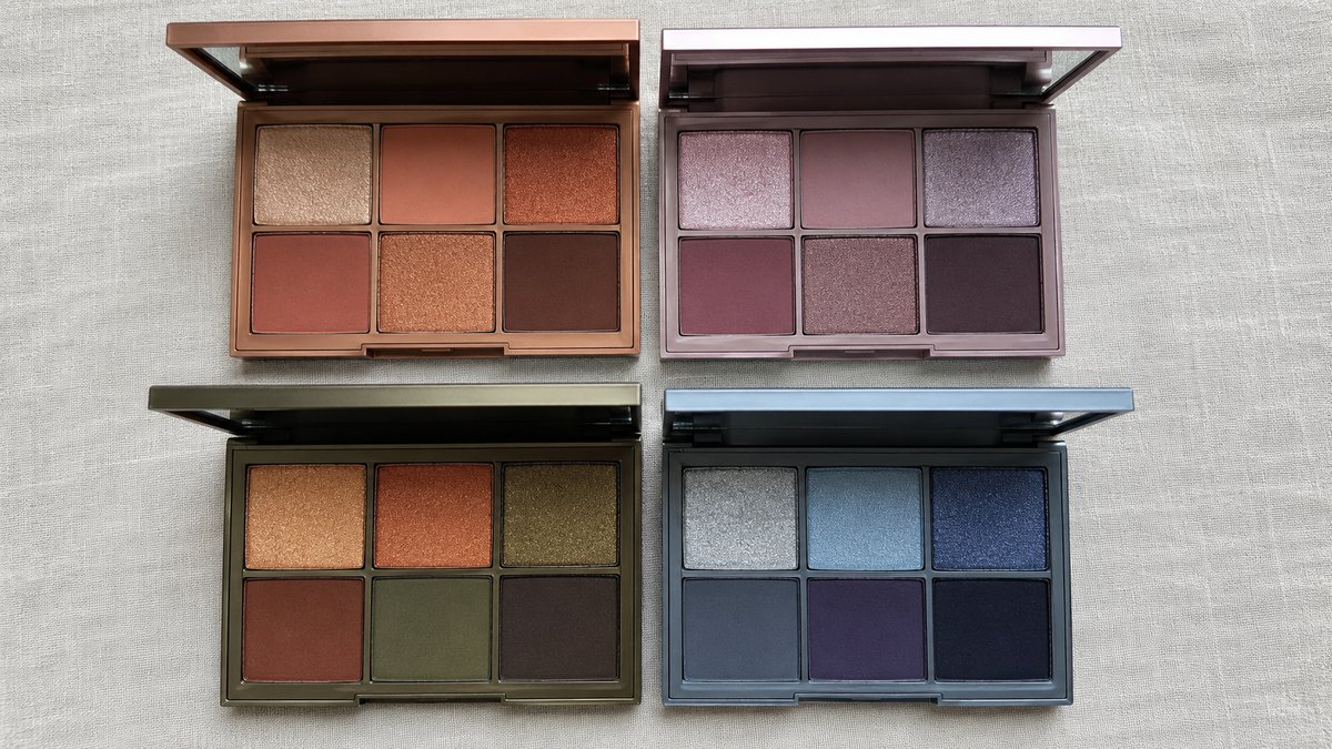Four open eyeshadow palettes showing warm and cool shades for the four colour analysis seasons